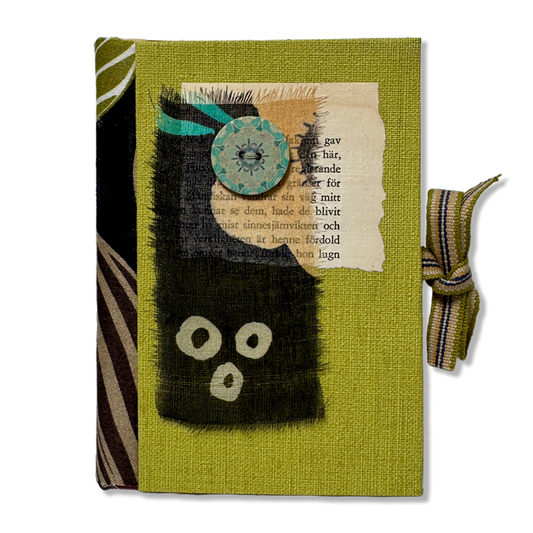 Anteckningsbok 'Förblir hon lugn' – handgjord i återvunnet material