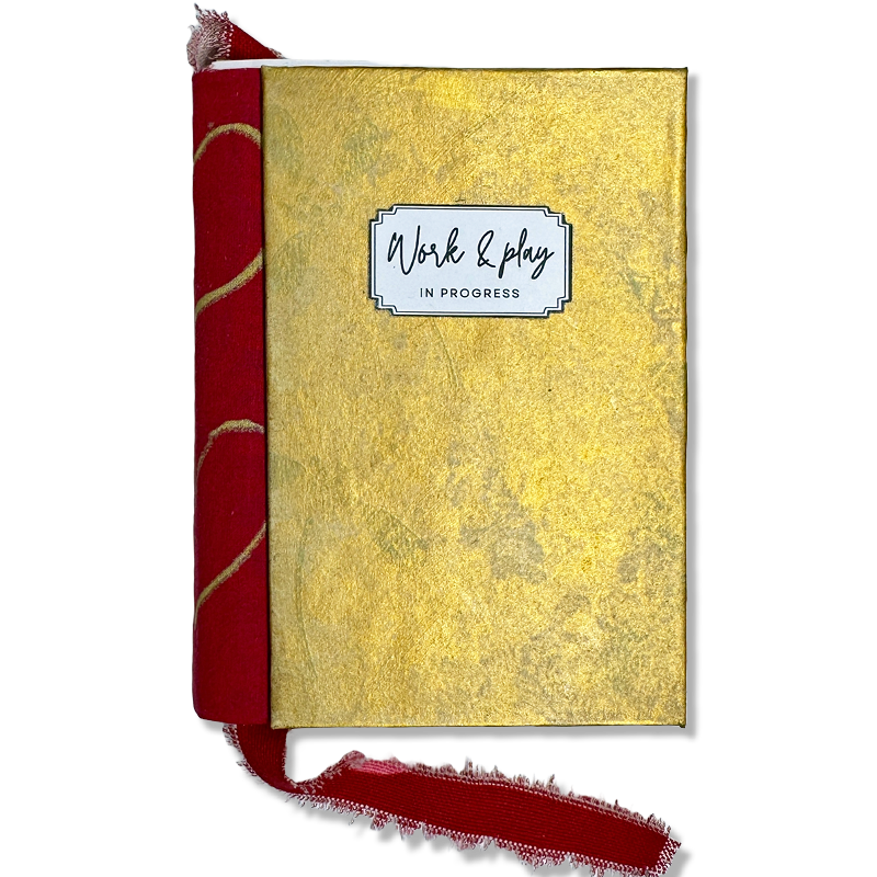 Anteckningsbok 'Work & play in progress' – handgjord i återvunnet material
